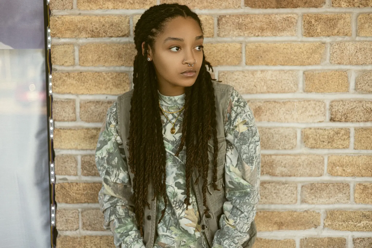 Portrait against a brick wall